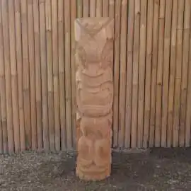 Tiki statue Polynesia style. From coconut palm 